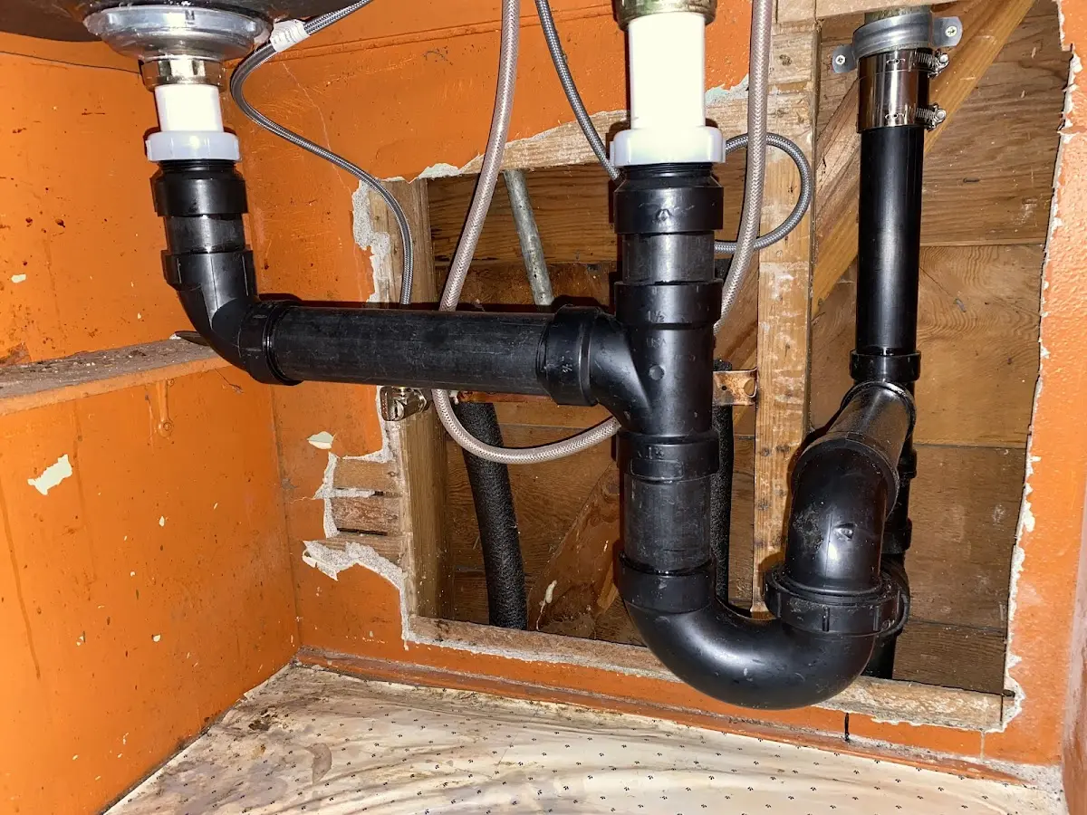Professional Garbage Disposal Repair equipment and tools on the job in Van Alstyne